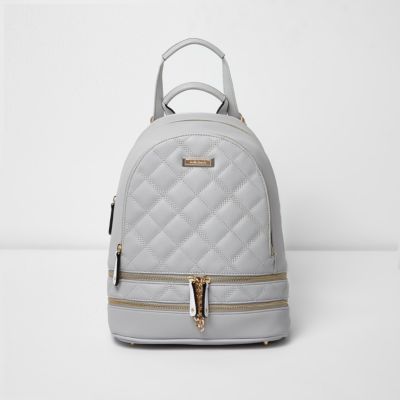 Grey quilted zip backpack